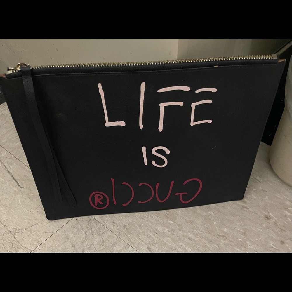 Authentic black Gucci clutch